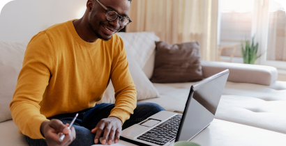 Man working on a laptop at home
